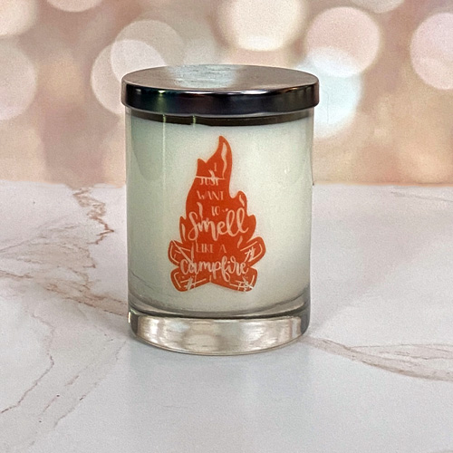 candle with campfire quote